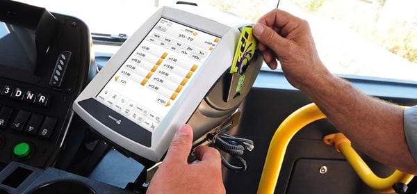 Rav-Kav smart ticketing console and card validation inside a bus